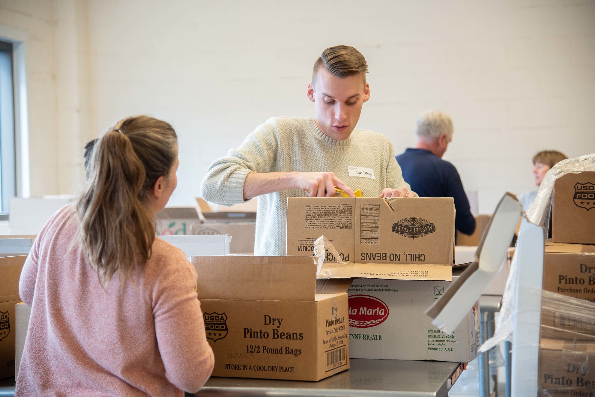 Employee packing boxes